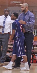 Senior Aquemini Gaston and coach Stevie Patrick