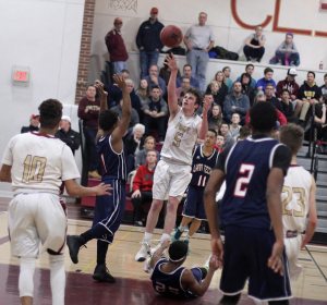 Cam MacRae shoots from in close