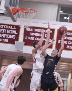 Dan Jameson tries to shoot over Casey McLaren