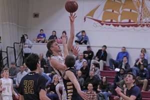 Brendan Powers gets off a shot in the lane