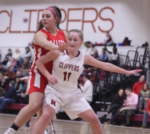 Katie Hadden looks for a pass with Stephanie Mini defending