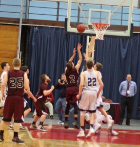 Josh Smestad (#2) converts a rebound with 24 seconds left