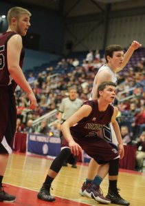 Josh Smestad (22 points) guards Mike Norton (27 points) on an inbounds play