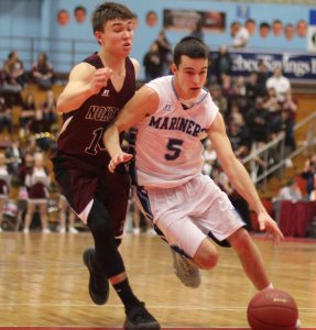 Nate Raye drives past Josh Perry