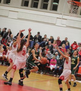 Kat Hassapis (16 points) finds space in the lane