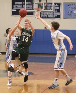 Gus Flaherty shoots the last shot of the first quarter