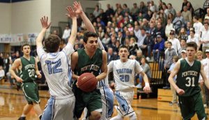 Nate McGrail squeezed between two Vikings