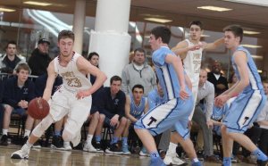 Brendan Powers tries to turn the corner on Jack McCarthy